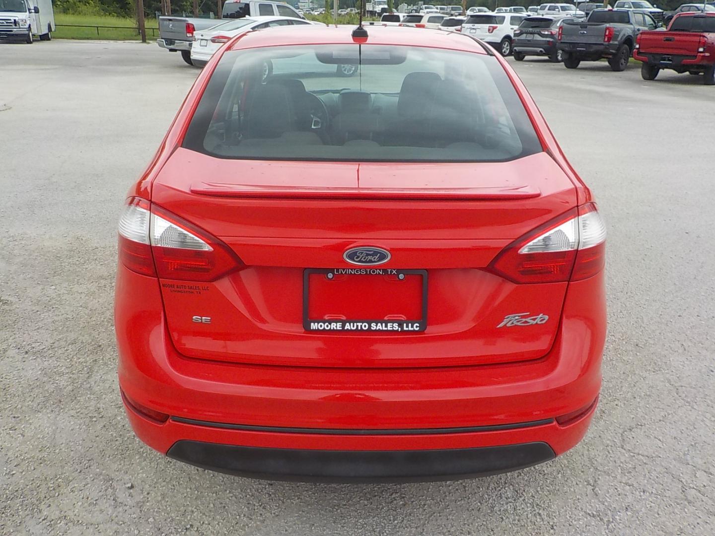 2014 Red /Charcoal Ford Fiesta (3FADP4BJ0EM) , Automatic transmission, located at 1617 W Church Street, Livingston, TX, 77351, (936) 327-3600, 30.710995, -94.951157 - WOW!! Need to check this one out for the price range it's in! You won't be disappointed! - Photo#7